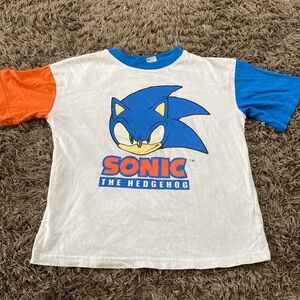 Gently worn blue white and orange Sonic the hedgehog shirt bous size 4-6yr
